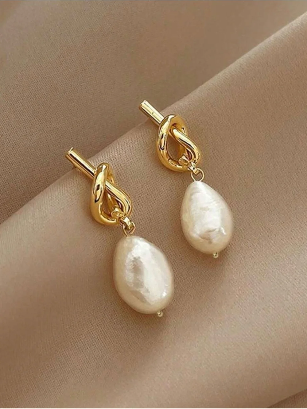 Gold Knot Drop Earrings with Cream Pearl Dangles